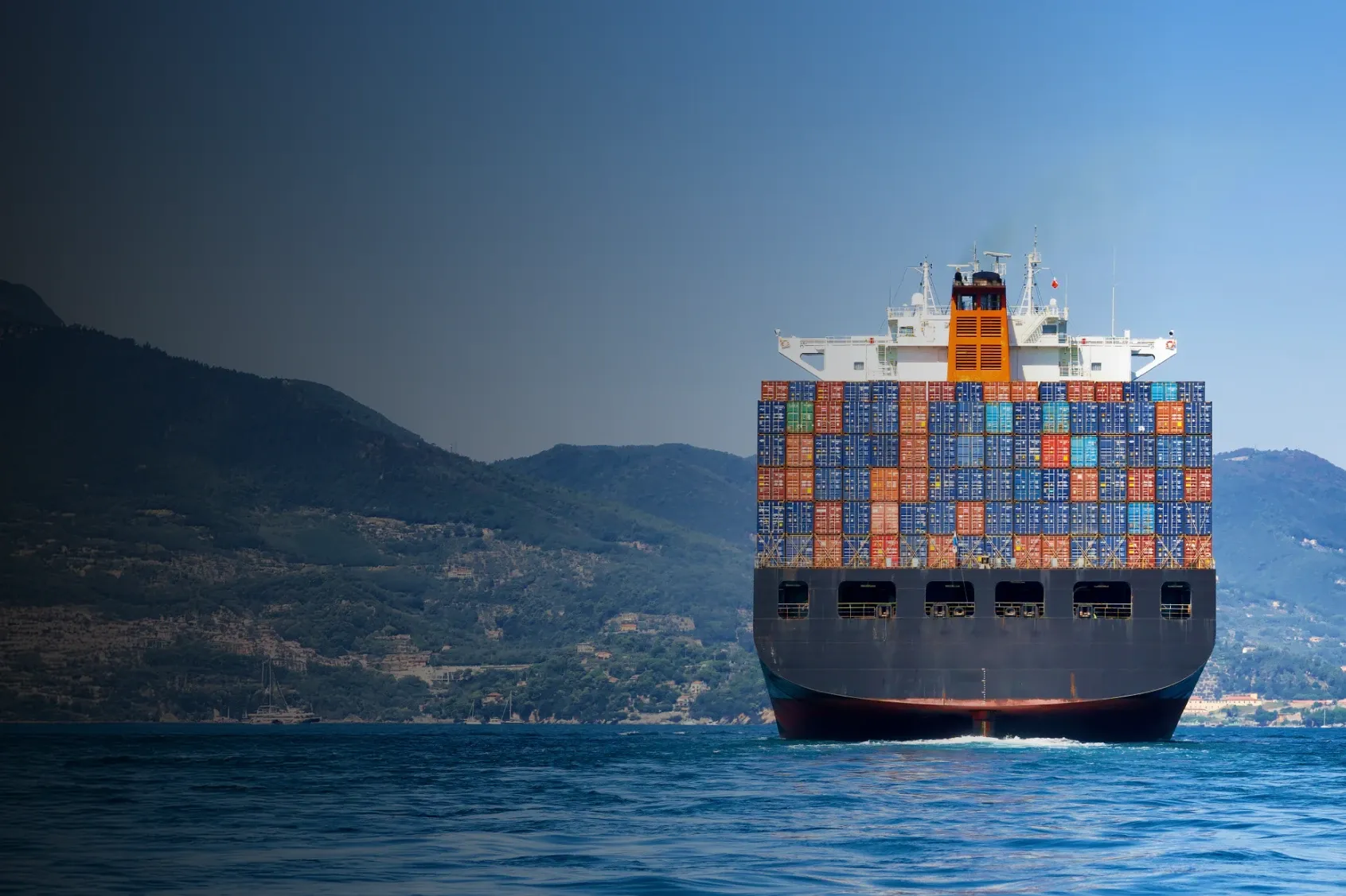 Container ship navigating through the ocean