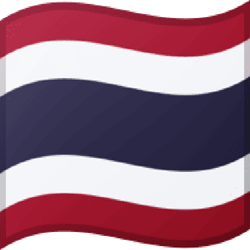 A vibrant Thai flag displays red and white stripes against a blue background representing the nations identity and
